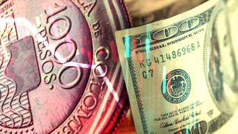 Peso colombiano y dólar. (Foto: Internet)