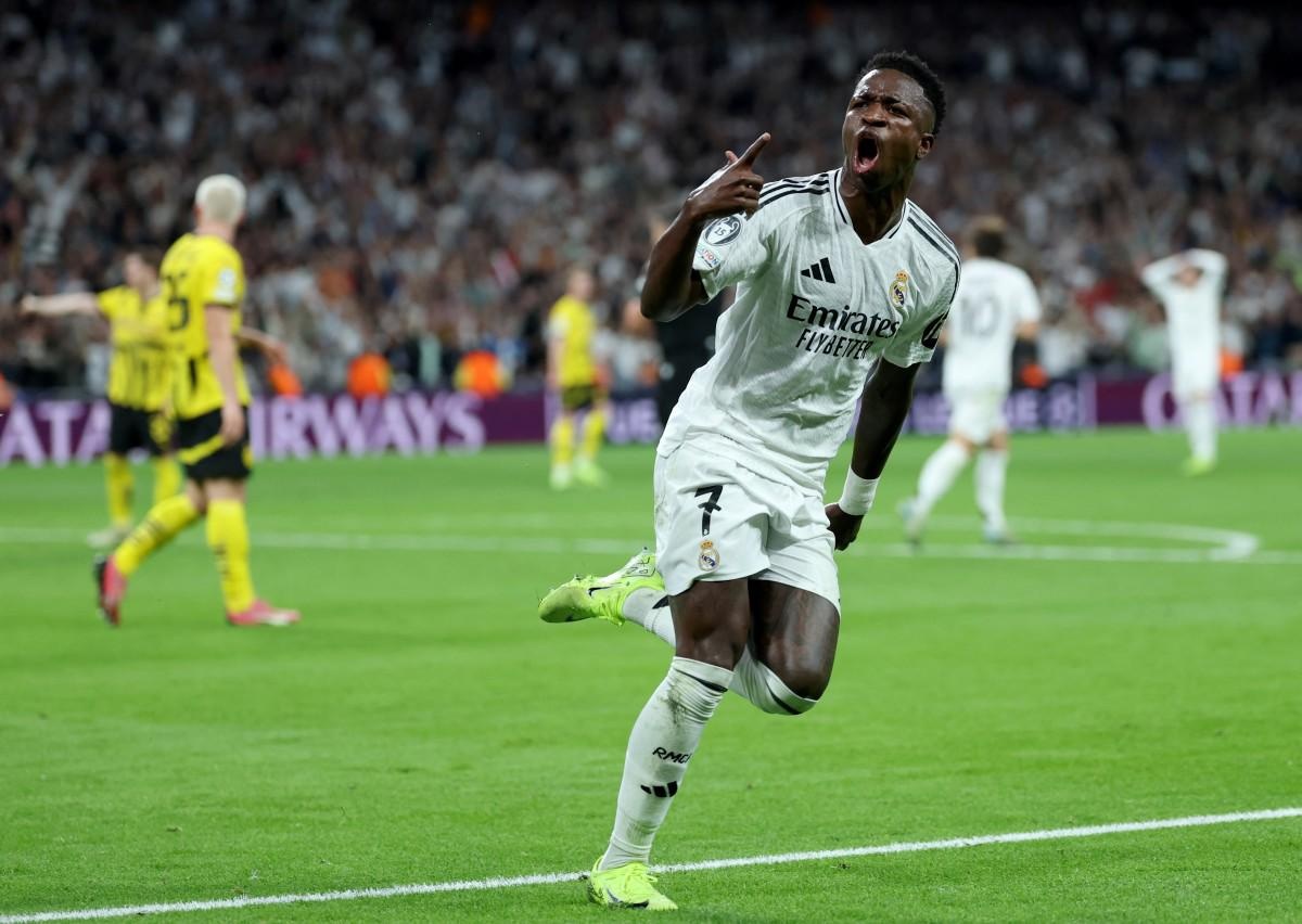 Vinícius Júnior celebra su gol ante el Borussia Dortmund por la Champions League (AFP)
