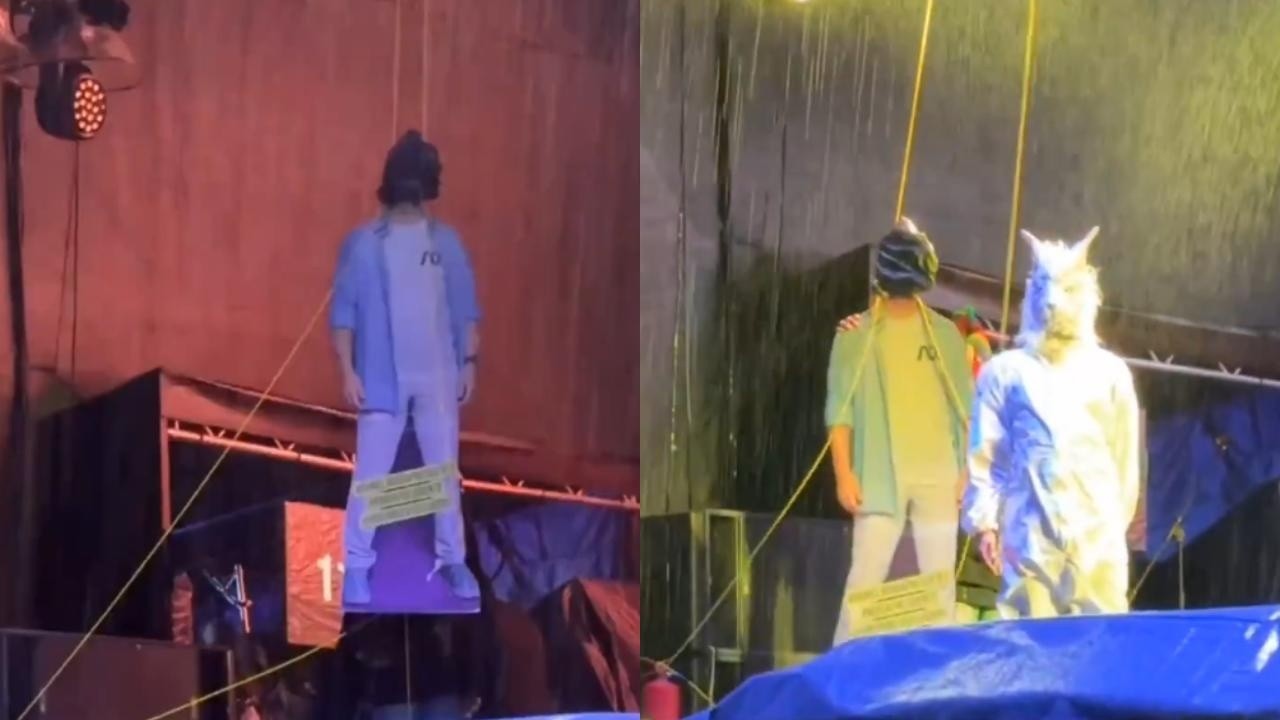 La imagen tenía el rostro tapado. En el escenario se simuló el ahorcamiento de la figura. La escena fue difundida en redes sociales y causó gran polémica. (Capturas de video)